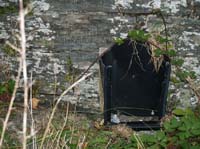 KG075481 remains of post box that the occupients used