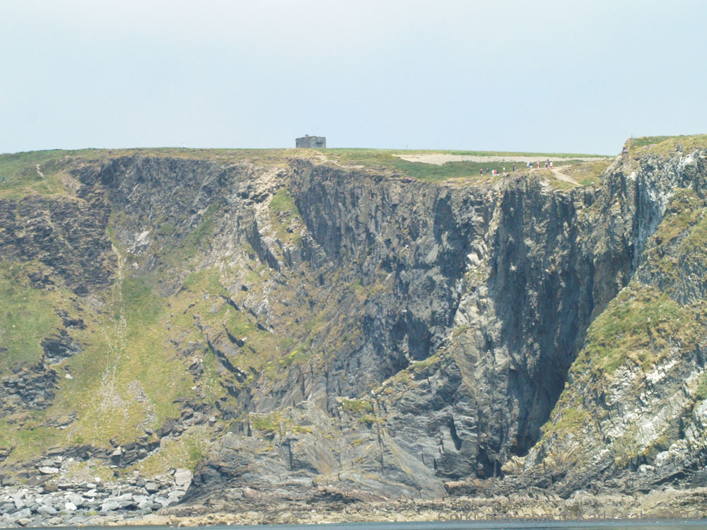 KG091826 signal tower people cliffs